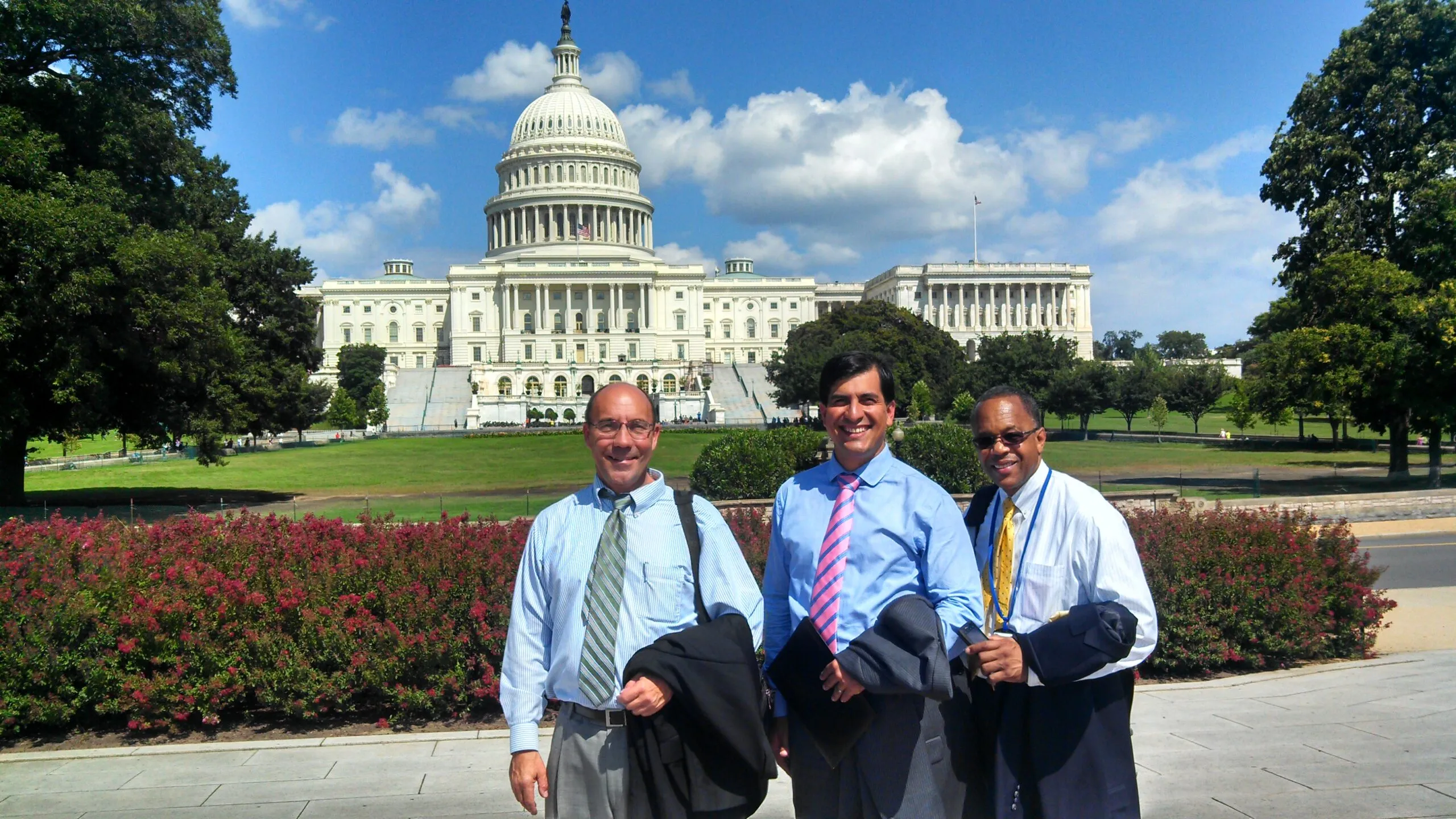 President of Vector Business Consulting Duane Pittman with two colleagues